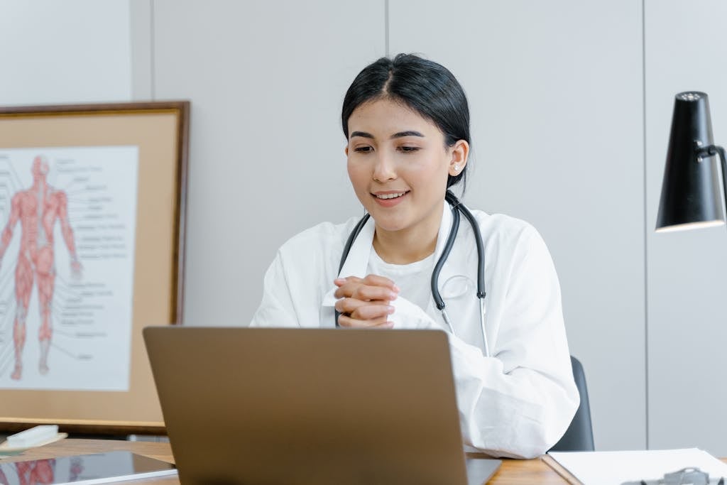 female doctor talking during a telehealth visit